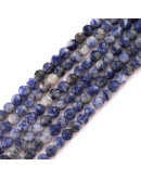 Sodalita. Moneda faceteada. 6x4 milímetros. 1 mm perforación. 55 uds hilo aprox. 1 hilo.