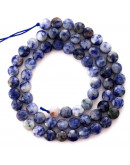 Sodalita. Moneda faceteada. 6x4 milímetros. 1 mm perforación. 55 uds hilo aprox. 1 hilo.