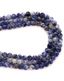 Sodalita. Moneda faceteada. 6x4 milímetros. 1 mm perforación. 55 uds hilo aprox. 1 hilo.