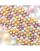 Concha de mar. Esfera. Color perla (7). 06 milímetros. 1 mm perforación. 60 uds hilo aprox. 1 hilo.