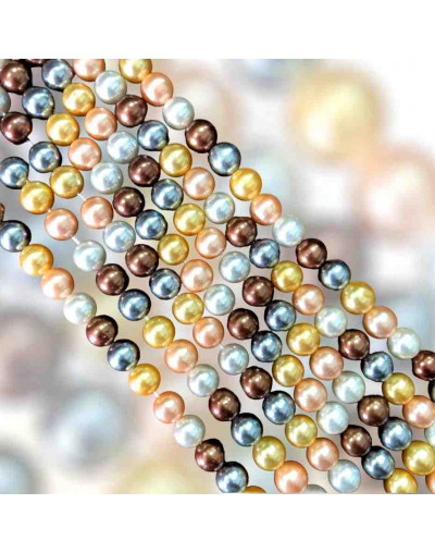 Concha de mar. Esfera. Color perla (2). 06 milímetros. 1 mm perforación. 60 uds hilo aprox. 1 hilo.