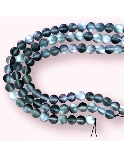 Piedra Luna Sintética. Color gris mate. 06 mm diámetro. 1 mm perforación. 60 uds hilo aprox. 1 hilo.