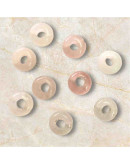 Cuarzo Rosa. Anillo. 10x4 milímetros. 1 mm perforación. 1 unidad. Cuarzo Rosa. Anillo. 10x4 milímetros. 1 mm perforación. 1 unidad.