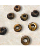 Ojo de Tigre. Anillo. 10x4 milímetros. 1 mm perforación. 1 unidad. Ojo de Tigre. Anillo. 10x4 milímetros. 1 mm perforación. 1 unidad.