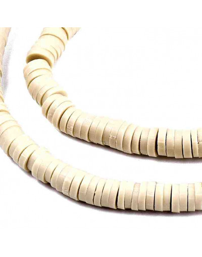 Discos. Color beige. 4 mm diámetro. 1 mm grosor. 380~400 uds hilo. 10 hilos.