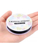 Hilo elástico. Color negro. 0,8 mm diámetro. 10 metros carrete. 1 carrete.