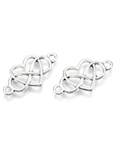 Infinito+Corazón. Aleación de cobre. Color plata antigua. 24x12x2 mm. 1,8 mm perforación. 5 uds.