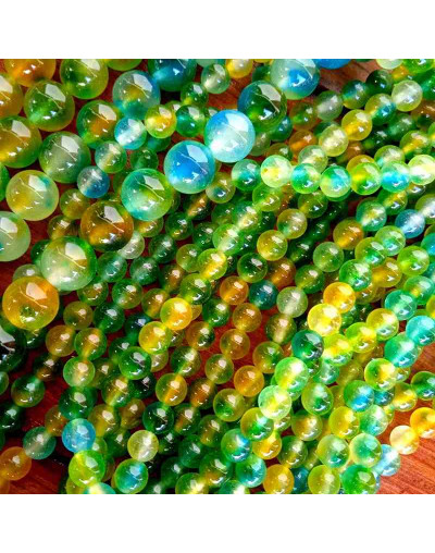 Calcedonia. Multicolor (1). 06 milímetros diámetro. 1 mm perforación. 60 uds hilo aproximado.