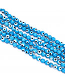Ojo turco. Esfera. Color Celeste. 04 mm diámetro. 1 mm perforación. 90 uds hilo aprox. 1 hilo. Ojo turco. Esfera. Color Celeste. 04 mm diámetro. 1 mm perforación. 90 uds hilo aprox. 1 hilo.