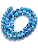 Ojo turco. Esfera. Color Celeste. 08 mm diámetro. 1 mm perforación. 45 uds hilo aprox. 1 hilo. Ojo turco. Esfera. Color Celeste. 08 mm diámetro. 1 mm perforación. 45 uds hilo aprox. 1 hilo.
