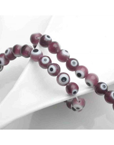 Ojo turco. Esfera. Color Morado. 04 mm diámetro. 1 mm perforación. 90 uds hilo aprox. 1 hilo.