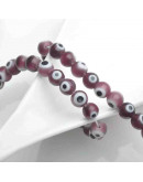 Ojo turco. Esfera. Color Morado. 06 mm diámetro. 1 mm perforación. 60 uds hilo aprox. 1 hilo. Ojo turco. Esfera. Color Morado. 06 mm diámetro. 1 mm perforación. 60 uds hilo aprox. 1 hilo.