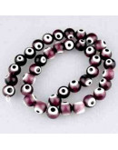 Ojo turco. Esfera. Color Morado. 08 mm diámetro. 1 mm perforación. 45 uds hilo aprox. 1 hilo. Ojo turco. Esfera. Color Morado. 08 mm diámetro. 1 mm perforación. 45 uds hilo aprox. 1 hilo.