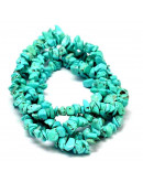 Chips 5-14 milímetros. Magnesita. 1 mm perforación. 250 unidades hilo aproximado. 1 hilo.