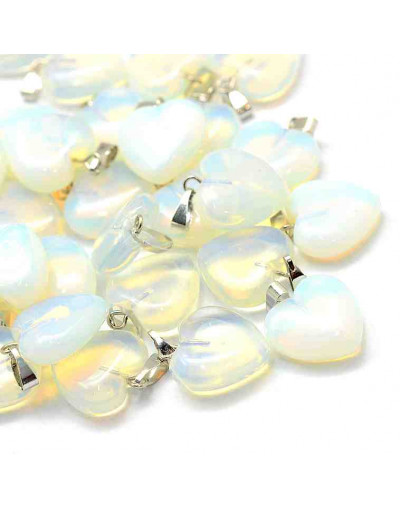 Opalina. Corazón. Aleación de cobre. Color plateado. 18x17x6 milímetros. 2x7 mm cierre. 1 unidad.