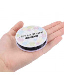 Hilo elástico. Color negro. 0,4 mm diámetro. 20 metros carrete. 1 carrete.