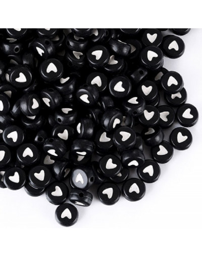 Corazón blanco sólido. Moneda negra. 7 milímetros lado. 1,5 mm perforación. 100 uds aproximado.