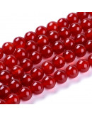 Carnelian. 06 milímetros diámetro. 1 mm perforación. 60 uds hilo aprox. 1 hilo.