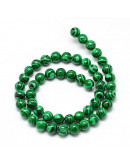 Malaquita sintética. 12 milímetros diámetro. 1 mm perforación. 30 unidades hilo aprox. 1 hilo.