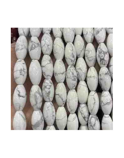 Howlite. Perforación vertical. 20x10 milímetros. 1 mm perforación. 1 unidad.