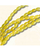 Calcedonia Teñida. Amarillo. Barril. 9x6 mm. 1 mm perforación. 40 uds hilo aprox. 1 hilo.