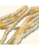 Calcedonia Teñida. Amarillo Multicolor. Barril. 9x6 mm. 1 mm perforación. 40 uds hilo aprox. 1 hilo.