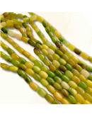 Calcedonia Teñida. Amarillo-Verde Mult. Barril. 9x6 mm. 1 mm perforación. 40 uds hilo aprox. 1 hilo.