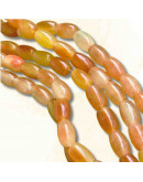 Calcedonia Teñida. Naranja Multicolor. Barril. 9x6 mm. 1 mm perforación. 40 uds hilo aprox. 1 hilo.