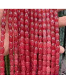 Calcedonia Teñida. Rojo Caramelo. Barril. 9x6 mm. 1 mm perforación. 40 uds hilo aprox. 1 hilo.