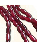 Calcedonia Teñida. Rojo Carnelian. Barril. 9x6 mm. 1 mm perforación. 40 uds hilo aprox. 1 hilo.