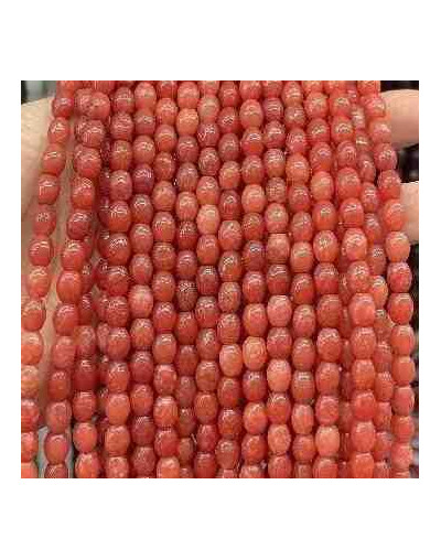 Calcedonia Teñida. Naraja Fuerte. Barril. 7x6 mm. 1 mm perforación. 45 uds hilo aprox. 1 hilo.