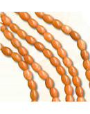 Calcedonia Teñida. Naraja Fuerte. Barril. 7x6 mm. 1 mm perforación. 45 uds hilo aprox. 1 hilo.