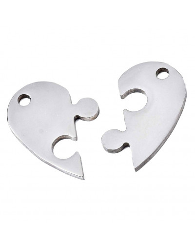 Corazón Puzzle. Acero inoxidable. Color plateado. 20x23x1,5 milímetros. 2 mm perforación. 1 set.