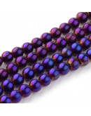 Esfera electroplateada. 06 milímetros diámetro. Púrpura. 1 mm perforación. 56 uds hilo (aproximado).