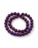 Esfera electroplateada. 06 milímetros diámetro. Púrpura. 1 mm perforación. 56 uds hilo (aproximado).