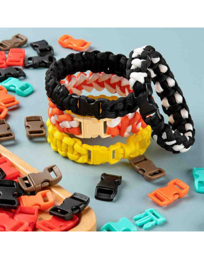 Hebilla TipTop. Plástico. Varios colores. 29x15x6 mm. 11x3,5 mm agujero. 10 set.