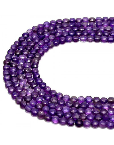 Amatista. Moneda faceteada. 6x4 milímetros. 1 mm perforación. 55 uds hilo aprox. 1 hilo.