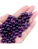 Amatista Grado 1A. 08 mm diámetro. 1 mm perforación. 45 uds hilo aprox. 1 hilo.