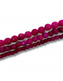 Calcedonia. Fuchsia. Faceteada. 08 mm diámetro. 1 mm perforación. 45 uds hilo aprox. 1 hilo.