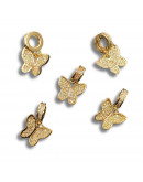 Mariposa. Aleación+Zirconia. Baño 18k gold. 20 milímetros. 2,5 mm perforación. 1 unidad.