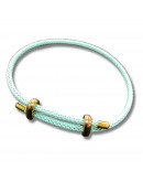 Poliester. Regulable pulsera. Color MEDIUM TURQUOISE. Baño 18KGold. 230x3 milímetros. 1 unidad.