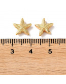 Estrella de Mar. Aleación de cobre. Baño 18k Gold. 10x10x3,5 mm. 1,4 mm perforación. 1 unidad. Estrella de Mar. Aleación de cobre. Baño 18k Gold. 10x10x3,5 mm. 1,4 mm perforación. 1 unidad.
