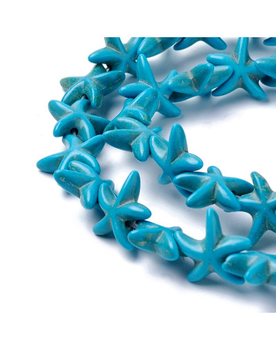 Turquesa sintética. Estrellas de mar. Color azul. 14x14 mm. 1 mm perforación. 35 uds hilo aprox.