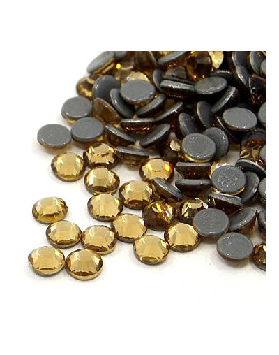 Rhinestone termo adhesivo. Faceteado. Color: Topaz. 1.9~2.0 mm (SS6). 1440 uds aprox. Rhinestone termo adhesivo. Faceteado. Color: Topaz. 1.9~2.0 mm (SS6). 1440 uds aprox.