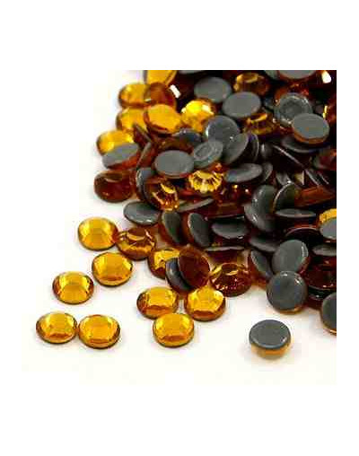 Rhinestone termo adhesivo. Faceteado. Color: Topaz. 4.6~4.8 mm (SS20). 360 uds aprox.