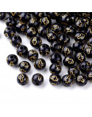 Religión: Cruz dorada. Esfera negra. 8 mm diámetro. 2 mm perforación. 50 uds aprox.