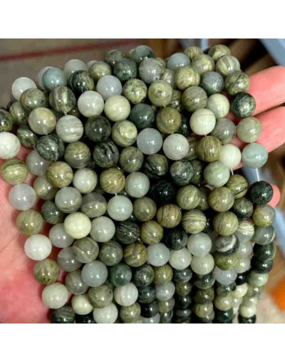 Jásper Green. 06 mm diámetro. 1 mm perforación. 60 uds hilo aprox.