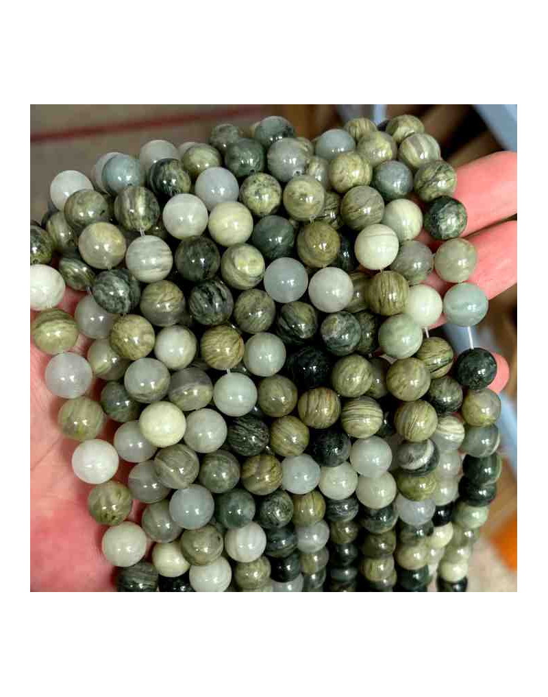 Jásper Green. 06 mm diámetro. 1 mm perforación. 60 uds hilo aprox. Jásper Green. 06 mm diámetro. 1 mm perforación. 60 uds hilo aprox.