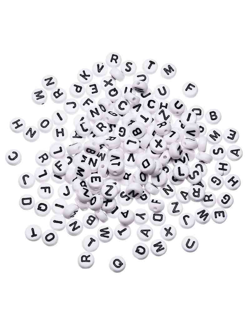 Letra negra. Moneda blanca. 7 milímetros diámetro. 1,5 mm perforación.3900 uds aprox. 500 gramos. Letra negra. Moneda blanca. 7 milímetros diámetro. 1,5 mm perforación.3900 uds aprox. 500 gramos.