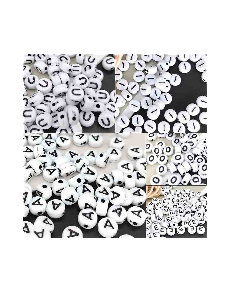 Letra negra. Moneda blanca. Vocales. 7 mm diámetro. 1,5 mm perforación. 100 uds. aproximado. Letra negra. Moneda blanca. Vocales. 7 mm diámetro. 1,5 mm perforación. 100 uds. aproximado.